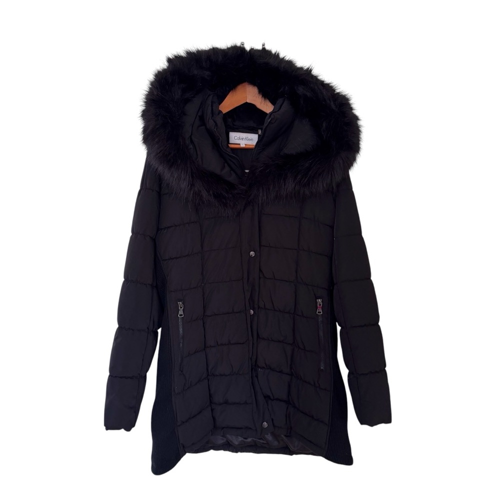 Calvin Klein faux fur coat with zipper lined layer and buttons on the outside.